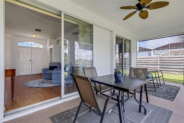 9402 71st Ave E, Palmetto, FL 34221 - sunroom / solarium featuring ceiling fan and outdoor dining space