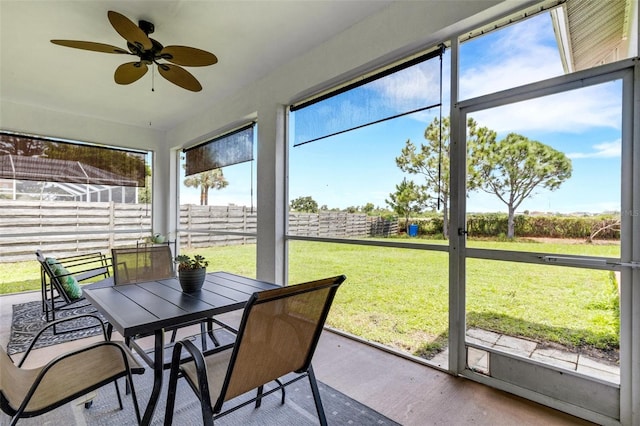 9402 71st Ave E, Palmetto, FL 34221 - sunroom / solarium with outdoor dining space and a ceiling fan