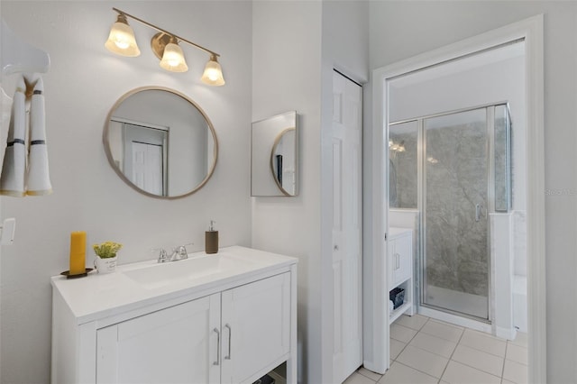 9402 71st Ave E, Palmetto, FL 34221 - bathroom with vanity, a stall shower, and tile patterned flooring