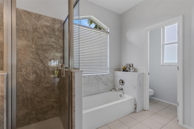 9402 71st Ave E, Palmetto, FL 34221 - bathroom with a garden tub, plenty of natural light, toilet, and a stall shower