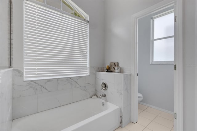 9402 71st Ave E, Palmetto, FL 34221 - full bath featuring a bath, toilet, and tile patterned flooring