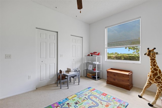 9402 71st Ave E, Palmetto, FL 34221 - playroom featuring light colored carpet, a ceiling fan, and baseboards
