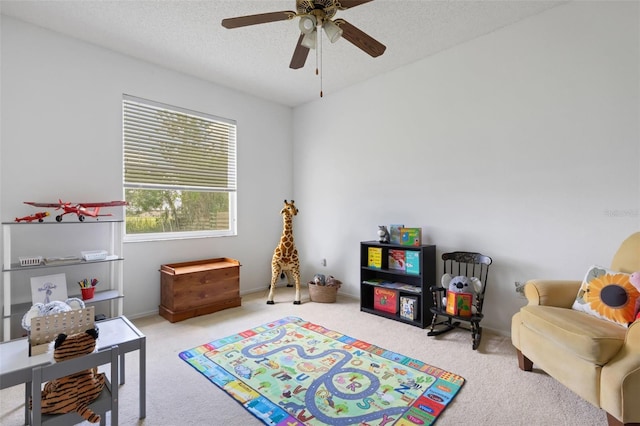 9402 71st Ave E, Palmetto, FL 34221 - rec room featuring carpet flooring, a ceiling fan, and a textured ceiling