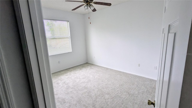 9402 71st Ave E, Palmetto, FL 34221 - carpeted empty room featuring a ceiling fan and baseboards