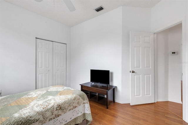 9402 71st Ave E, Palmetto, FL 34221 - bedroom featuring light wood finished floors, a closet, and a ceiling fan
