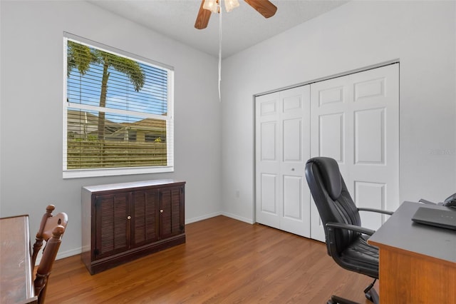 9402 71st Ave E, Palmetto, FL 34221 - office with a ceiling fan, light wood finished floors, and baseboards