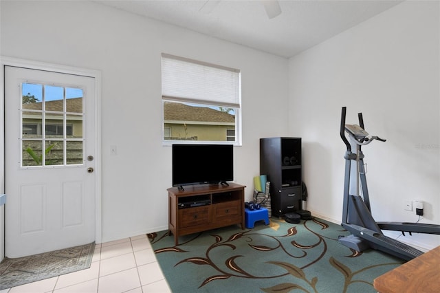 9402 71st Ave E, Palmetto, FL 34221 - exercise room featuring baseboards, a ceiling fan, and tile patterned floors