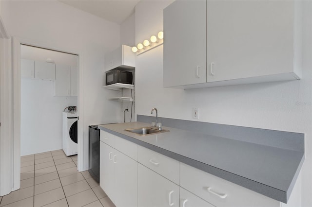 9402 71st Ave E, Palmetto, FL 34221 - kitchen with washer / dryer, a sink, white cabinetry, open shelves, and light tile patterned flooring