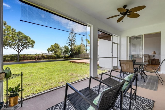 9402 71st Ave E, Palmetto, FL 34221 - sunroom / solarium featuring ceiling fan and outdoor dining area