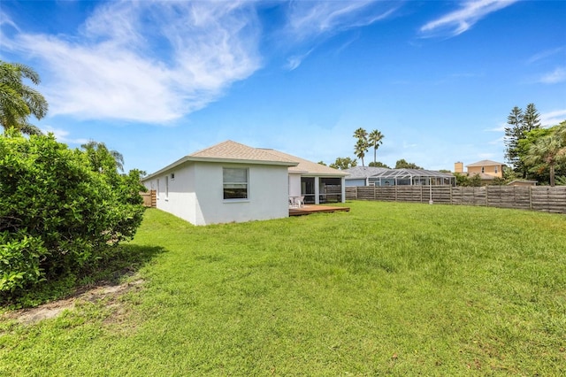 9402 71st Ave E, Palmetto, FL 34221 - rear view of property featuring stucco siding