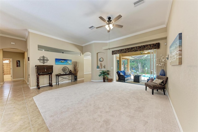 5359 90th Avenue Cir E, Parrish, FL 34219 - sitting room featuring arched walkways, a ceiling fan, ornamental molding, baseboards, and light tile patterned flooring