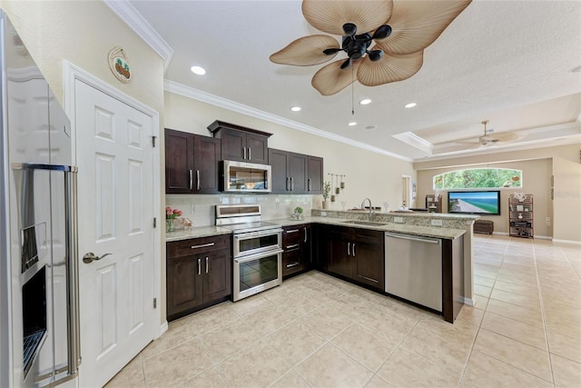 5359 90th Avenue Cir E, Parrish, FL 34219 - kitchen featuring appliances with stainless steel finishes, a sink, ceiling fan, crown molding, and light tile patterned flooring