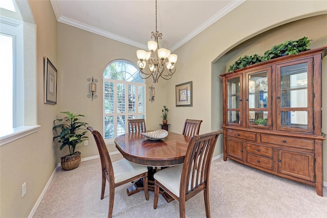 5359 90th Avenue Cir E, Parrish, FL 34219 - dining area featuring light colored carpet, ornamental molding, a chandelier, and baseboards