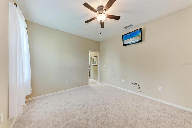 5359 90th Avenue Cir E, Parrish, FL 34219 - empty room featuring carpet flooring, ceiling fan, and baseboards