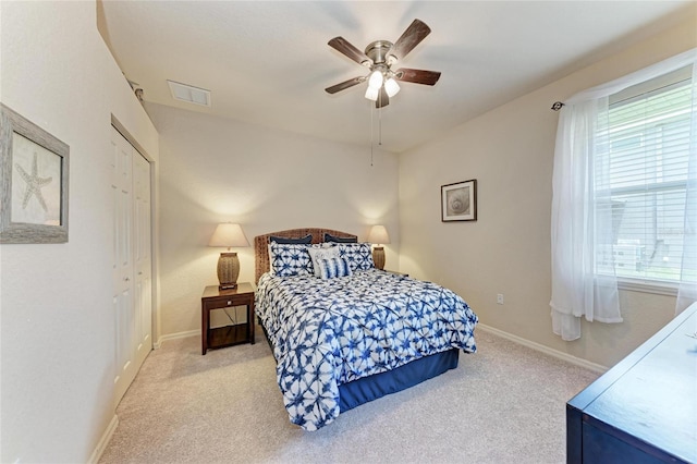 5359 90th Avenue Cir E, Parrish, FL 34219 - bedroom featuring carpet floors, baseboards, a closet, and ceiling fan