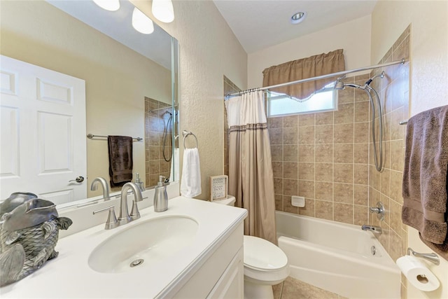 5359 90th Avenue Cir E, Parrish, FL 34219 - full bath with toilet, vanity, shower / bath combo, a textured wall, and tile patterned flooring