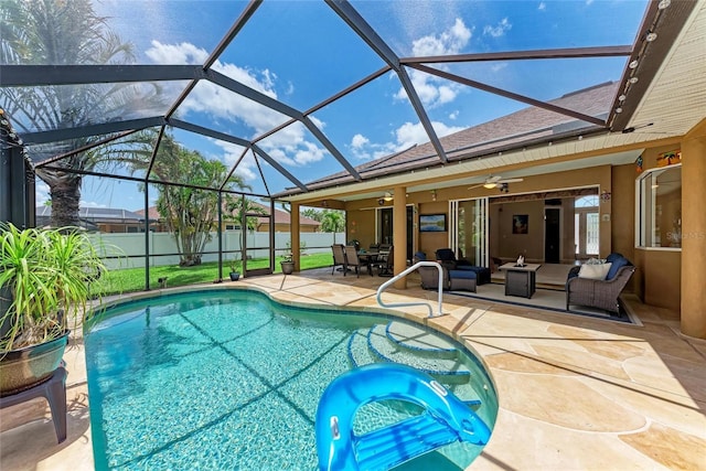 5359 90th Avenue Cir E, Parrish, FL 34219 - view of pool with a patio area, outdoor lounge area, a fenced backyard, a ceiling fan, and glass enclosure