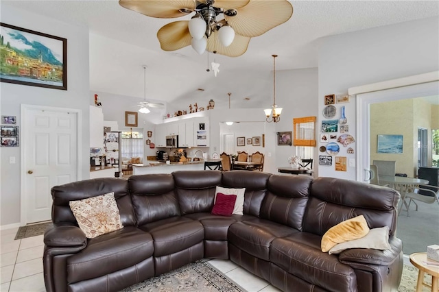 6405 Alesheba Ln, Sarasota, FL 34240 - living room with a ceiling fan, light tile patterned floors, and high vaulted ceiling