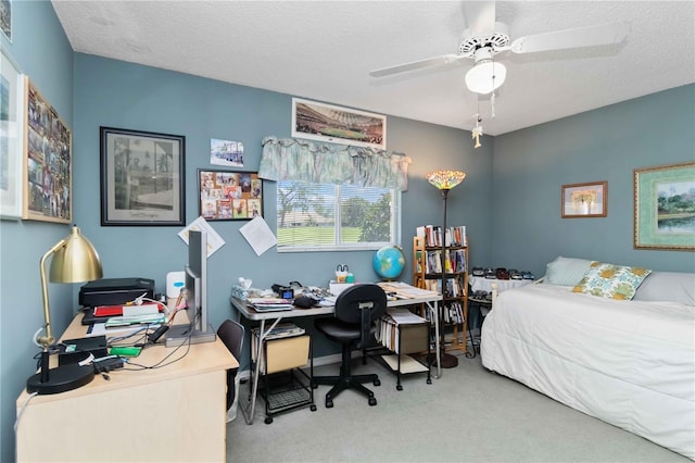 6405 Alesheba Ln, Sarasota, FL 34240 - bedroom with carpet, a desk, ceiling fan, and a textured ceiling