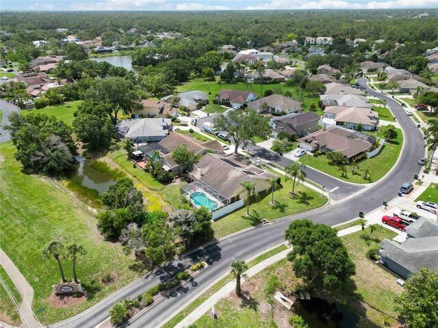 6405 Alesheba Ln, Sarasota, FL 34240 - aerial view of property and surrounding area with a large body of water and nearby suburban area