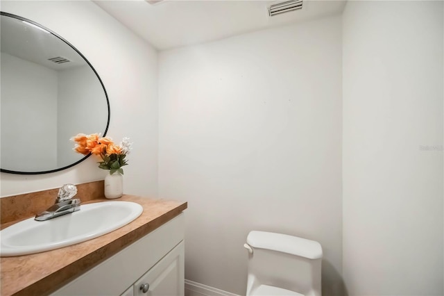 6860 Whitman Ct Unit 32B, Sarasota, FL 34243 - half bath featuring vanity and toilet