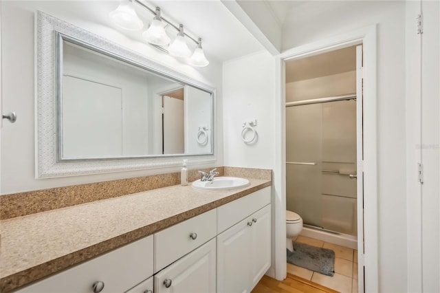 6860 Whitman Ct Unit 32B, Sarasota, FL 34243 - full bath with toilet, vanity, a stall shower, and tile patterned floors