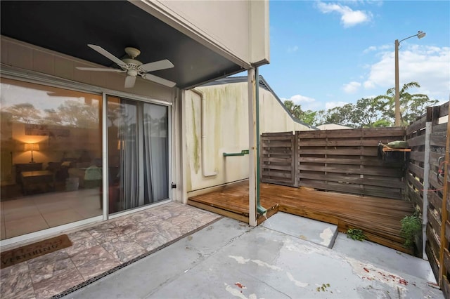 6860 Whitman Ct Unit 32B, Sarasota, FL 34243 - view of patio featuring ceiling fan and a deck