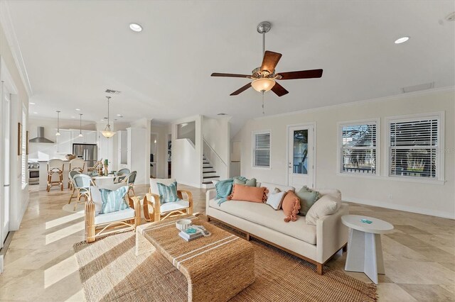634 Key Royale Dr, Holmes Beach, FL 34217 - living area featuring stairs, a ceiling fan, crown molding, recessed lighting, and baseboards