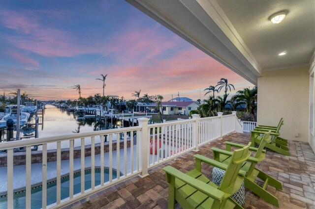 634 Key Royale Dr, Holmes Beach, FL 34217 - balcony with a water view, a boat dock, and boat lift