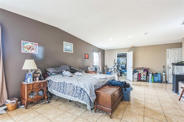 225 Sherwood Ln, Daytona Beach, FL 32117 - bedroom with light tile patterned flooring and lofted ceiling