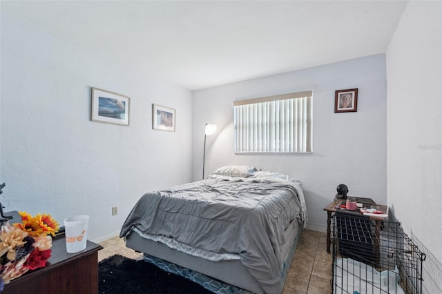 225 Sherwood Ln, Daytona Beach, FL 32117 - tiled bedroom with baseboards