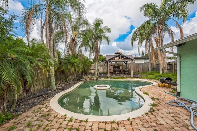 225 Sherwood Ln, Daytona Beach, FL 32117 - view of pool featuring a gazebo, a fenced backyard, and a patio area