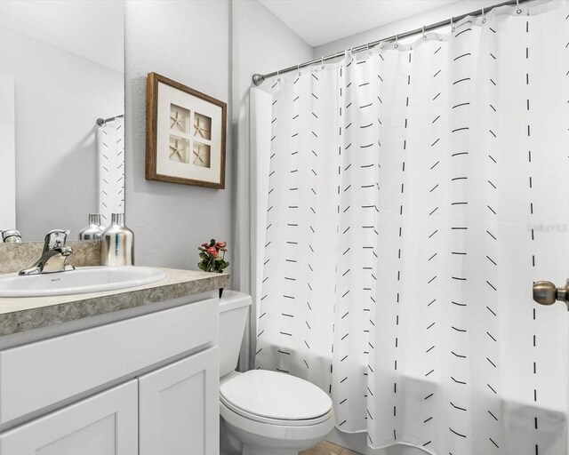 7295 Donahue St, Port Charlotte, FL 33981 - full bath with vanity, shower / tub combo, and toilet