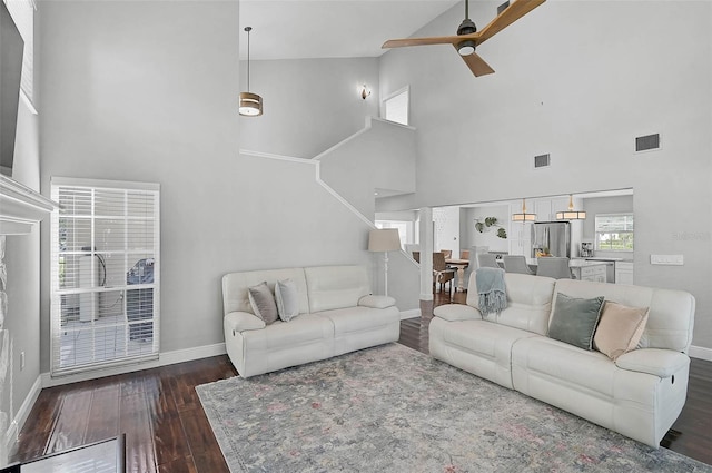 13514 4th Plz E, Bradenton, FL 34212 - living area with high vaulted ceiling, a ceiling fan, and dark wood-style floors