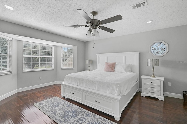 13514 4th Plz E, Bradenton, FL 34212 - bedroom with wood finished floors, a textured ceiling, ceiling fan, and recessed lighting