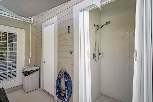 13514 4th Plz E, Bradenton, FL 34212 - full bathroom featuring a shower stall and wooden walls