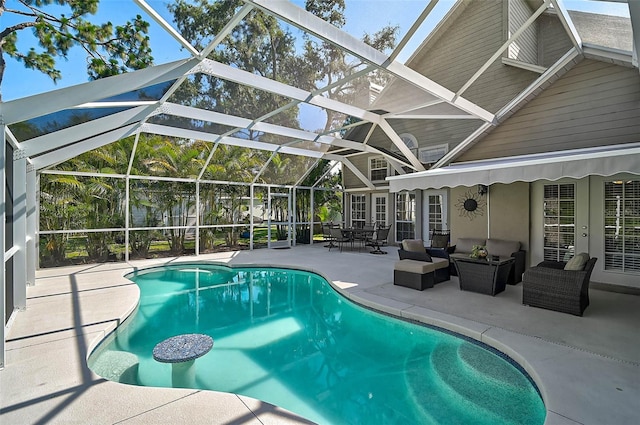 13514 4th Plz E, Bradenton, FL 34212 - outdoor pool featuring a patio area, an outdoor living space, french doors, and a lanai
