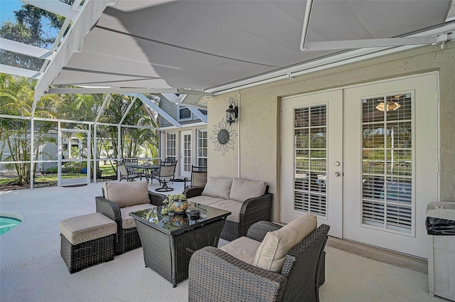 13514 4th Plz E, Bradenton, FL 34212 - view of patio / terrace featuring french doors, an outdoor hangout area, and glass enclosure