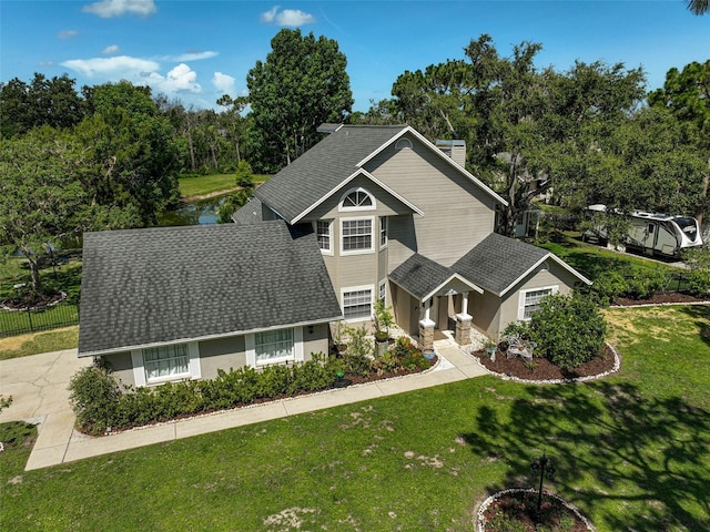 13514 4th Plz E, Bradenton, FL 34212 - traditional-style house featuring a shingled roof