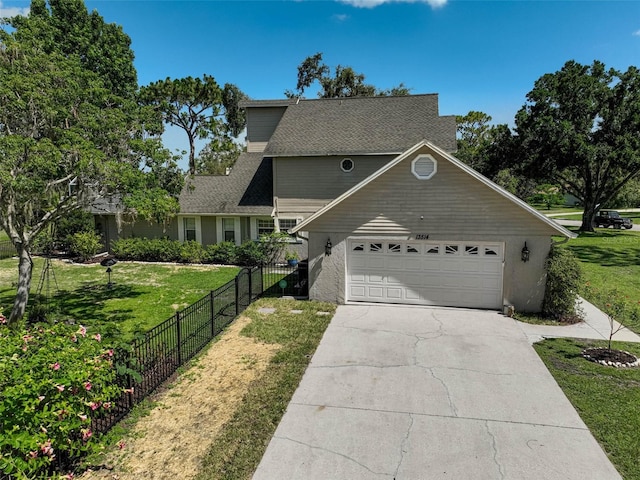 13514 4th Plz E, Bradenton, FL 34212 - view of front of house with a garage, driveway, and roof with shingles