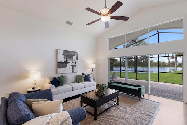 12031 Longview Lake Cir, Lakewood Ranch, FL 34211 - living area featuring a water view, a ceiling fan, and high vaulted ceiling