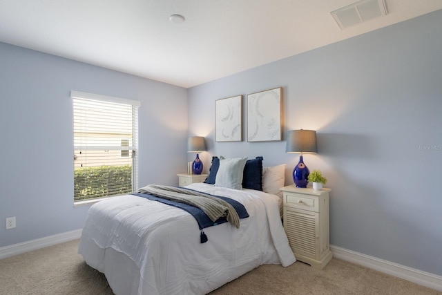12031 Longview Lake Cir, Lakewood Ranch, FL 34211 - bedroom with light colored carpet and baseboards