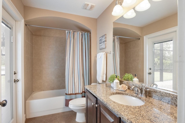 12031 Longview Lake Cir, Lakewood Ranch, FL 34211 - bathroom with toilet, vanity, shower / bathtub combination with curtain, and tile patterned floors