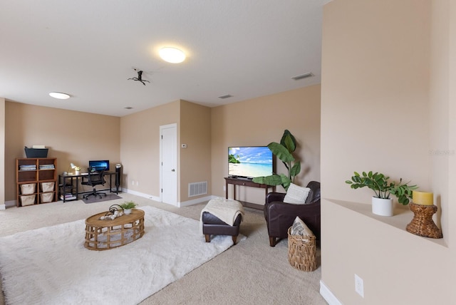 12031 Longview Lake Cir, Lakewood Ranch, FL 34211 - carpeted living room with baseboards and an office area