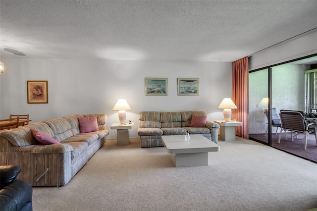 3500 El Conquistador Pkwy Unit 128, Bradenton, FL 34210 - living area with light colored carpet, a textured ceiling, and a chandelier
