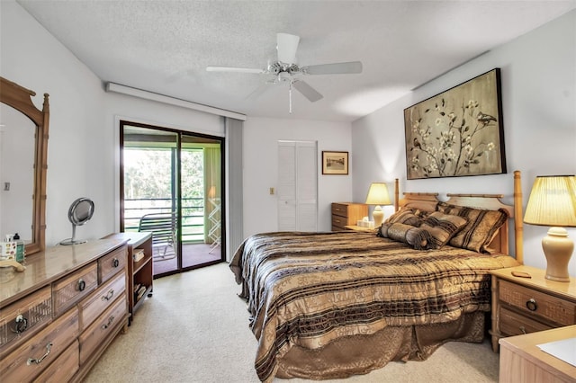 3500 El Conquistador Pkwy Unit 128, Bradenton, FL 34210 - bedroom featuring access to outside, light carpet, ceiling fan, and a closet