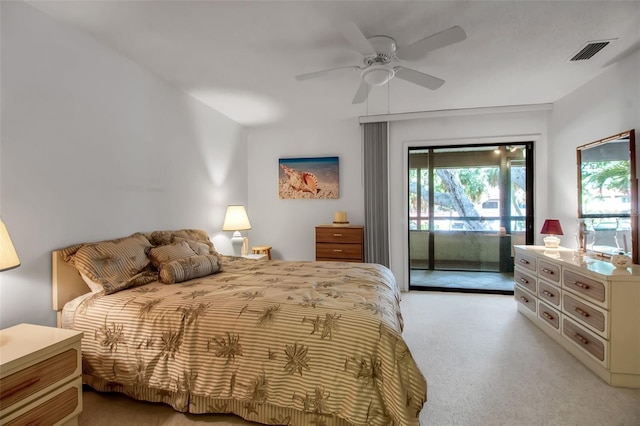 3500 El Conquistador Pkwy Unit 128, Bradenton, FL 34210 - carpeted bedroom with access to exterior, multiple windows, and ceiling fan
