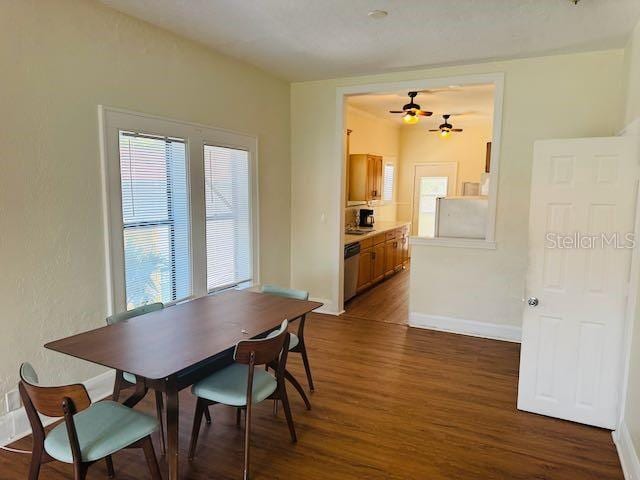 1412 12th Ave W, Bradenton, FL 34205 - dining space with dark wood finished floors and baseboards