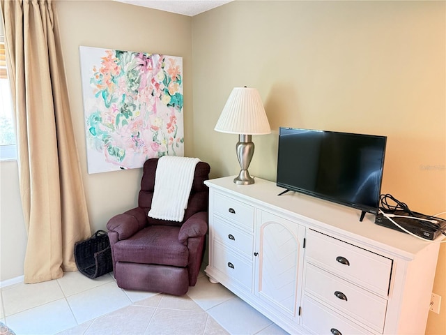 390 301st Blvd W Unit 2C, Bradenton, FL 34205 - living area featuring light tile patterned floors