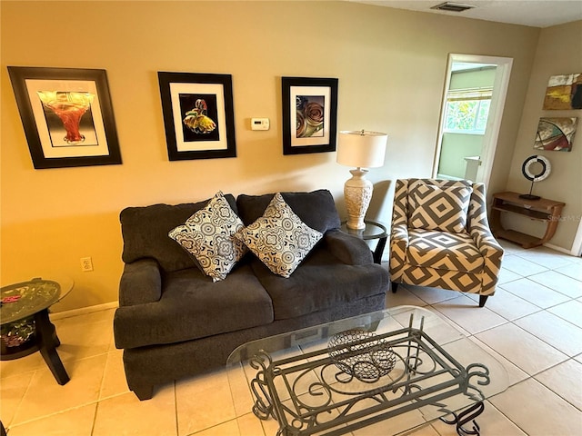 390 301st Blvd W Unit 2C, Bradenton, FL 34205 - living room with tile patterned flooring and baseboards